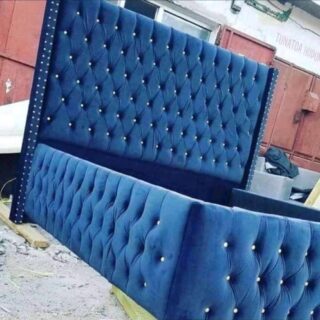 Blue tufted bed frame